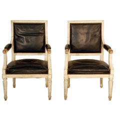 Pair of chic Louis XVI white washed black leather armchairs