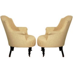 Pair of Napoleon III bergeres upholstered in toile bisonne
