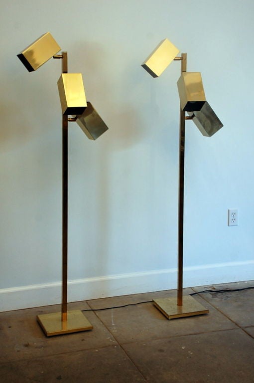 Pair of articulated Koch + Lowy brass floor lamps