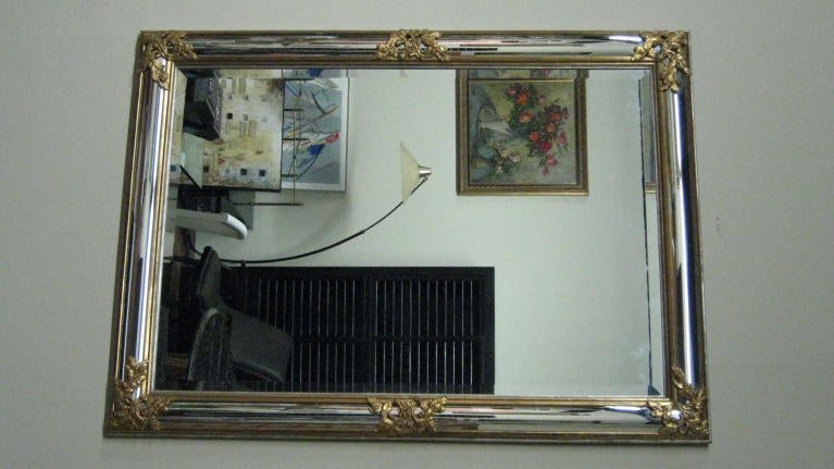 Curved Frame Mirror with Handcarved and Gold Leaf Decoration