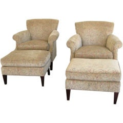 PAIR OF CLUB ARMCHAIRS WITH OTTOMANS BY BAKER