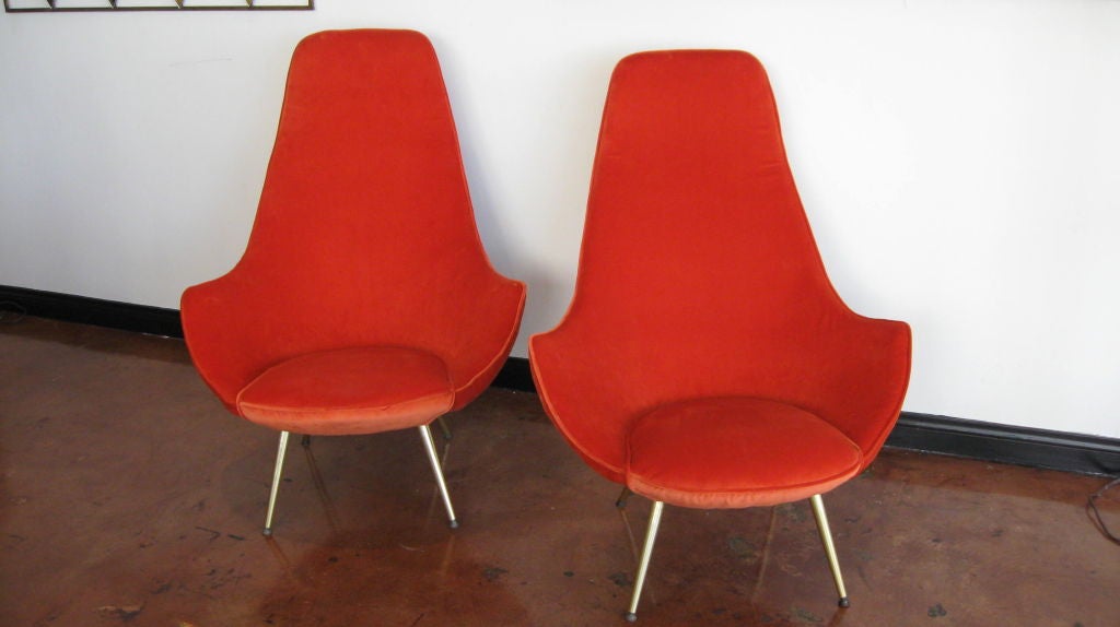 Pair of armchairs in the style of Ico Parisi. Newly upholstered in orange velvet. Brass legs. Original upholstery was made of horsehair.