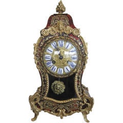 FRENCH TORTOISE AND BRONZE ORMOLU CLOCK