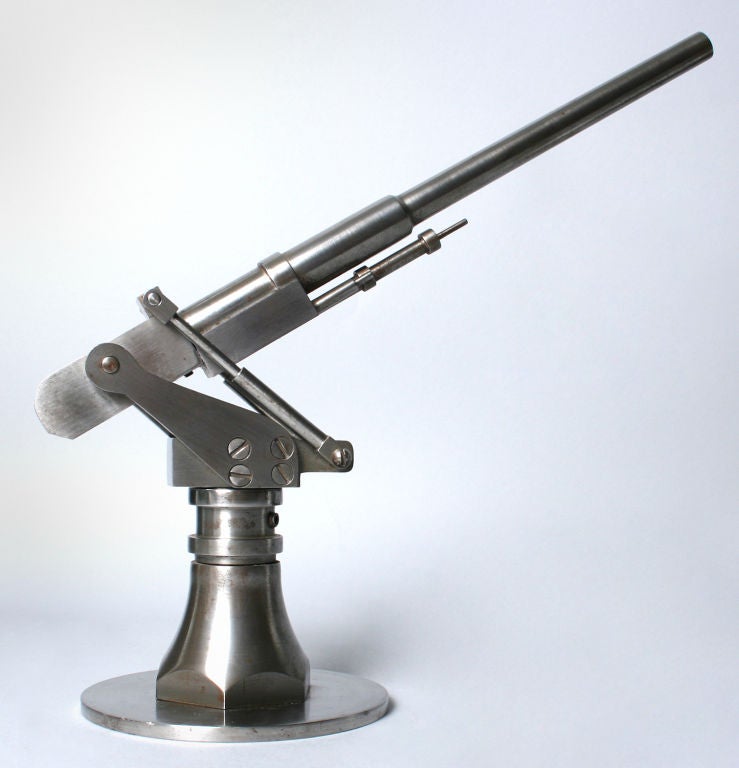 These are two rare hand machined models of submarine World War ll Cannons. Each adjusts vertically as well as horizontally. They are being sold either as a pair or individually.  There is a slight variation between the two.  One measures 12.