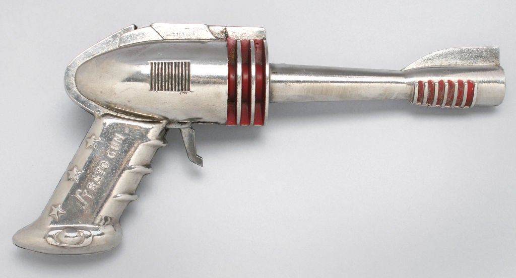 This is the Strato Gun by Futuristic Products Company of Detroit, Mich. It harkens back to the days of Flash Gordon. The Strato was a cap gun with a chrome finish. 1953. It was invented by Sidney Wasserman and Allen M. Sterns.<br />
<br