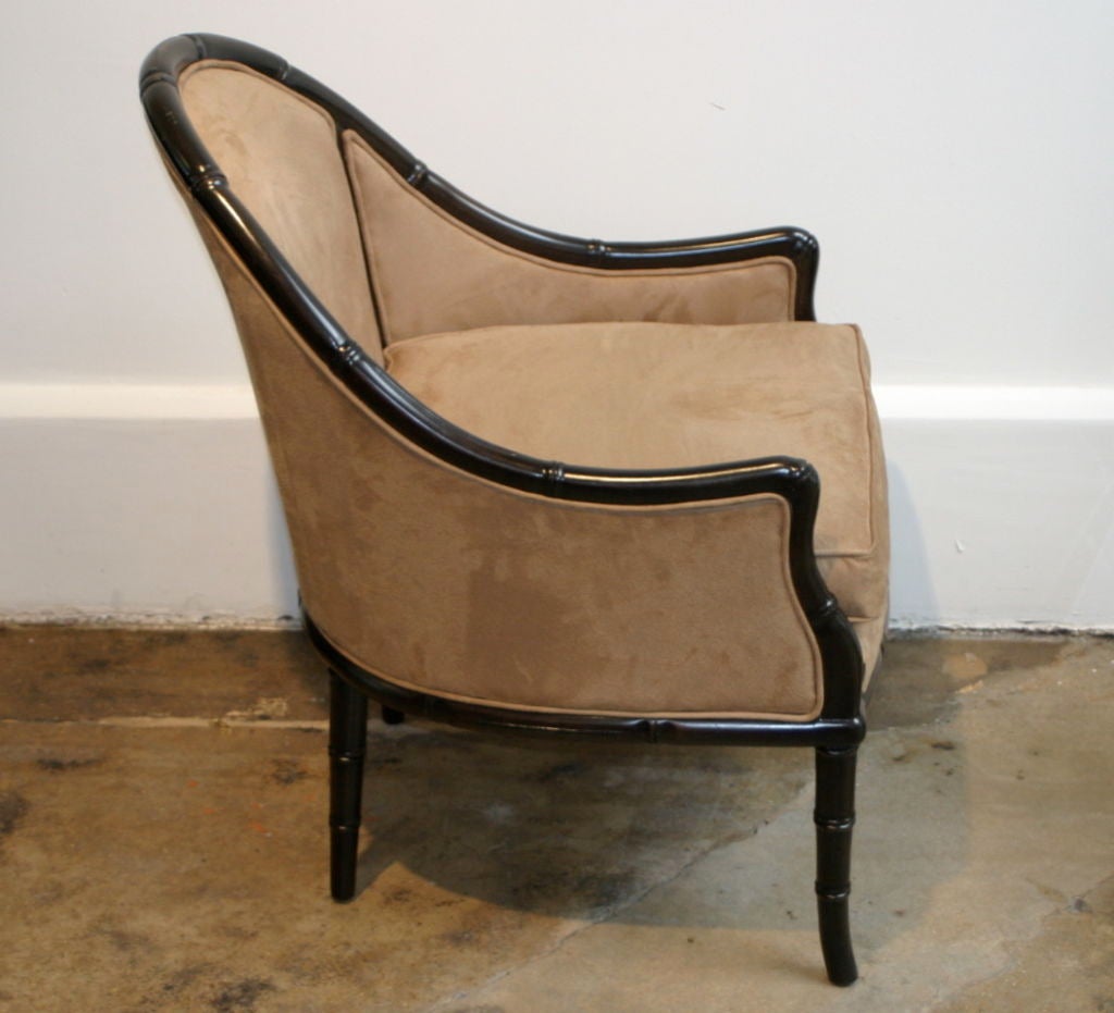 Pair of faux bamboo chairs with dark brown finish and upholstery in ultra suede. Reduced price is net and for the pair.