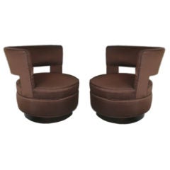Pair of Harvey Probber swivel chairs with cut out back