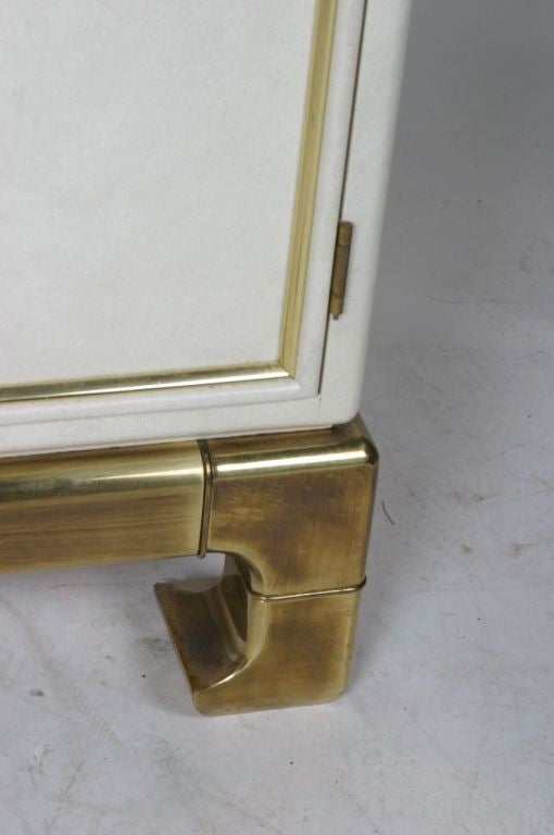 Mastercraft Asian Modern cabinet with brass base and details