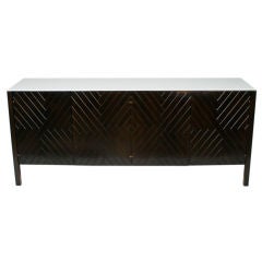 Chevron door cabinet with vitrolite top