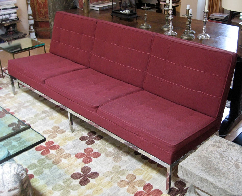 An elegant Knoll sofa with its original (custom) wine-colored upholstery and original label