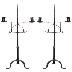 Pair of elegant 17th c. wrought iron adjustable candlesticks Pair of elegant 17th c. wrought iron adjustable candlesticks