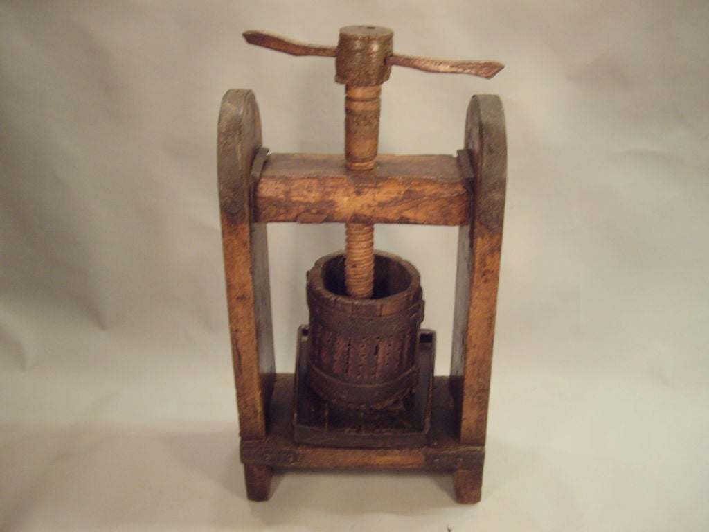 19th century Italian grape press for making wine.