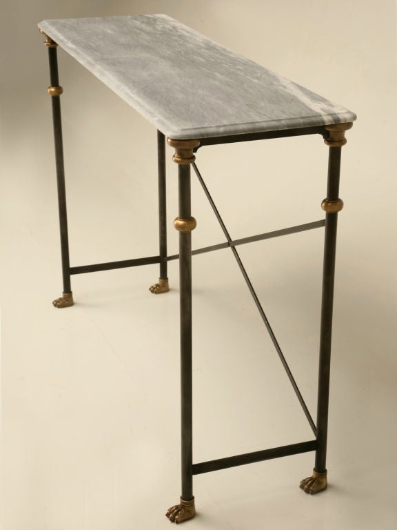 Custom handmade stainless steel and bronze console table with your choice of tops. Having a custom finish in a mottled charcoal effect shown in images 4, 5, & 6 and handmade to the designer’s specifications. Our own in-house artisans can make you