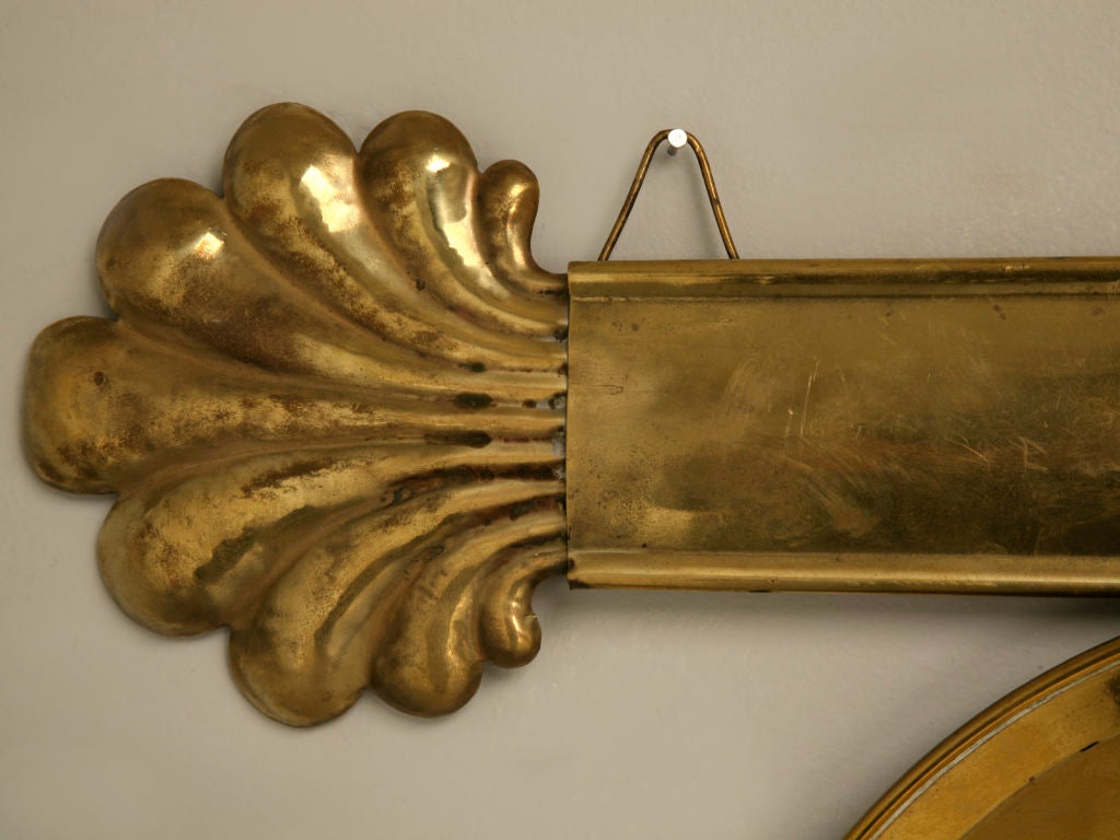 Mid-20th Century c.1930 French Brass Graduated Pot Lids on Wall Rack
