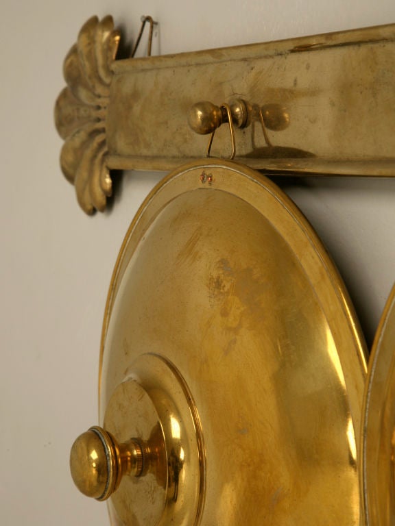 c.1930 French Brass Graduated Pot Lids on Wall Rack 1