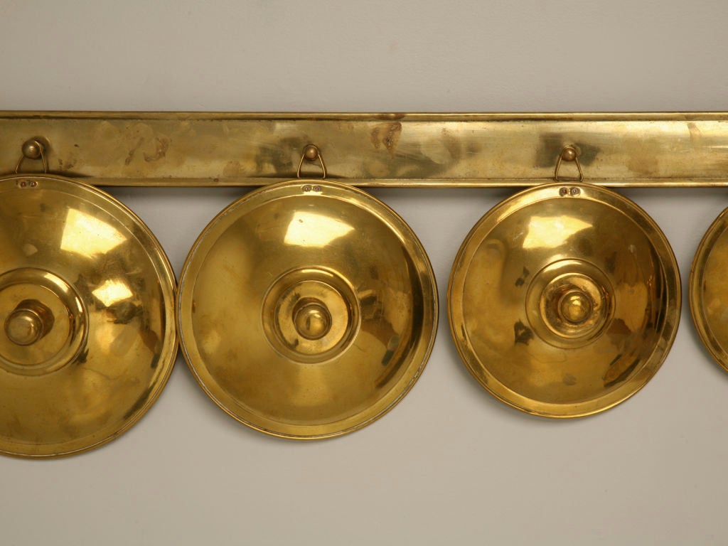 c.1930 French Brass Graduated Pot Lids on Wall Rack 4