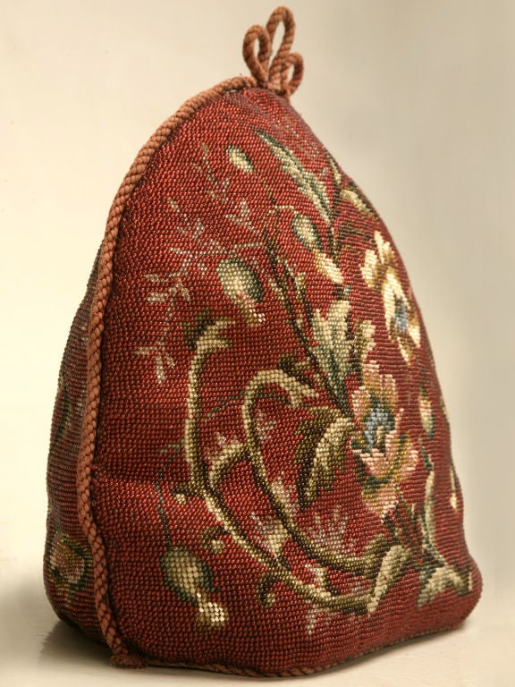 Spectacular antique English hand-beaded tea cozy-- unusual to find this nice. Usually socialites of the 19th century had servants or staff to do the mundane chores of normal housekeeping responsibilities, freeing the lady of the home to have