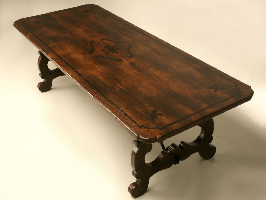 Spanish dining table replicating an authentic 13' antique table we used to own. Totally handcrafted, our Old Plank craftsmen re-created the antique in a smaller version for a local designer. Everything is correct, even the iron braces and the way