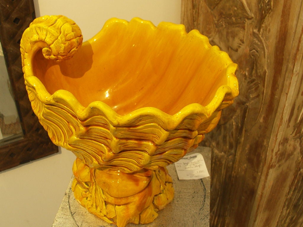Dramatic large yellow centerpiece with seashell motif by the English company Burmantofts.
