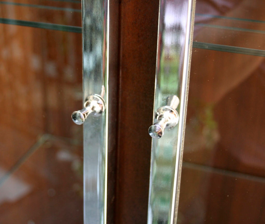 An American Walnut Vitrine with Raised Chrome Molded Edges