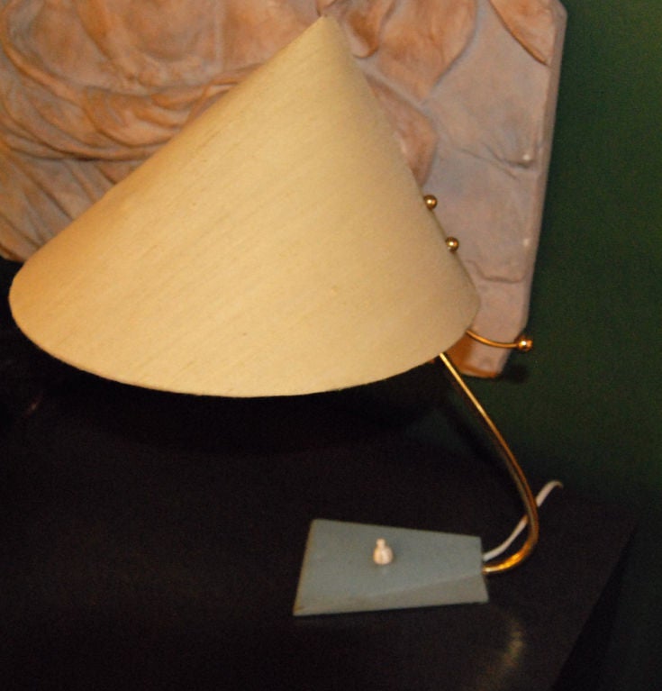 FRENCH 1950'S SINGLE TABLE LAMP IN THE STYLE OF PIERRE GUARICHE WITH ORIGINAL ADJUSTABLE ASIAN STYLE SHADE AND BRASS DETAILS.