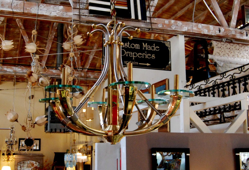 1970 Six-light brass, steel and glass details chandelier in the style of Maison Jansen.