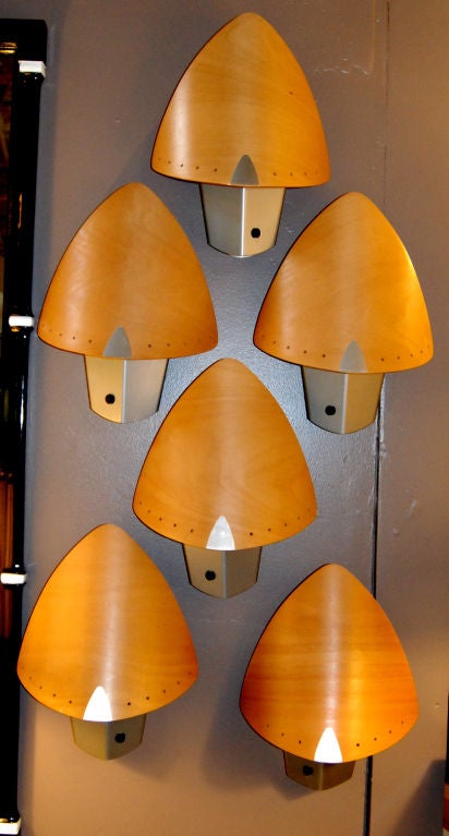 Decorative wood and metal wall sconces.