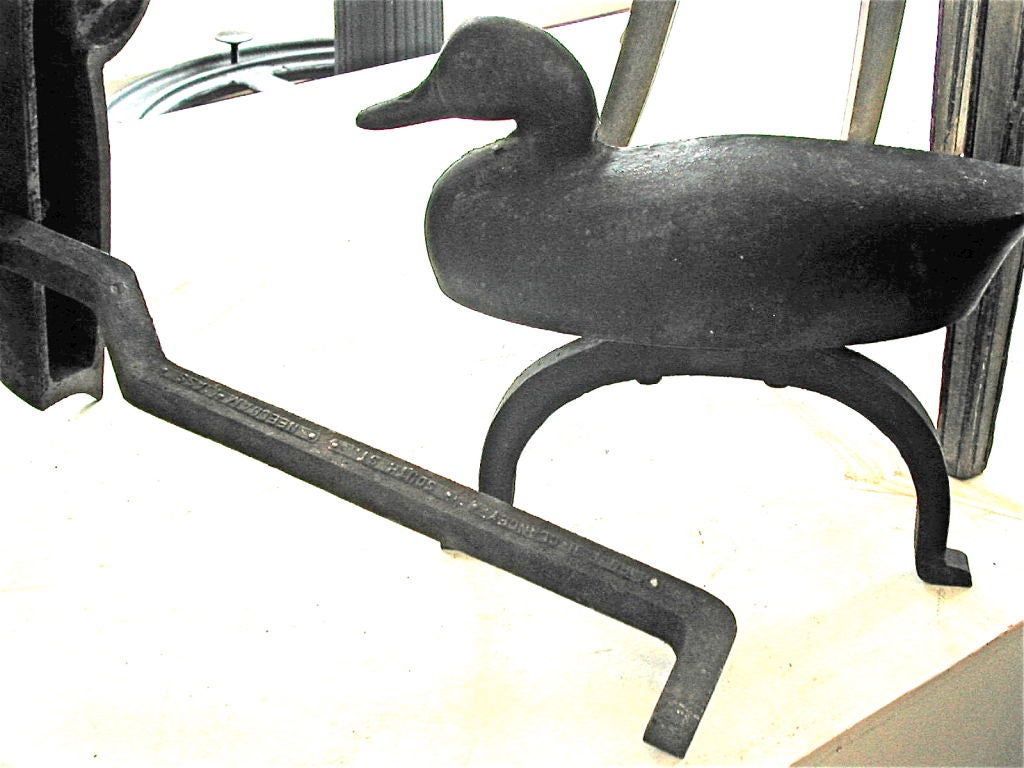 A nice pair of cast iron American made andirons in the form of a duck. These are not seen too often and were made in Needham, Massachusetts by Richard F.H. Clancey, South Street, Needham, Mass.
