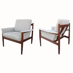 Pair of Exposed Frame Teak Danish Armchairs