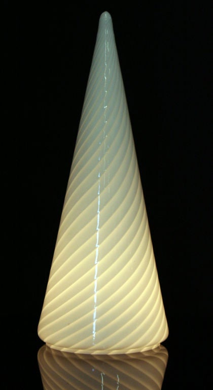 A hand blown milk spiraling conical Murano Table lamp in white on opaque white striped glass; with original switch.
