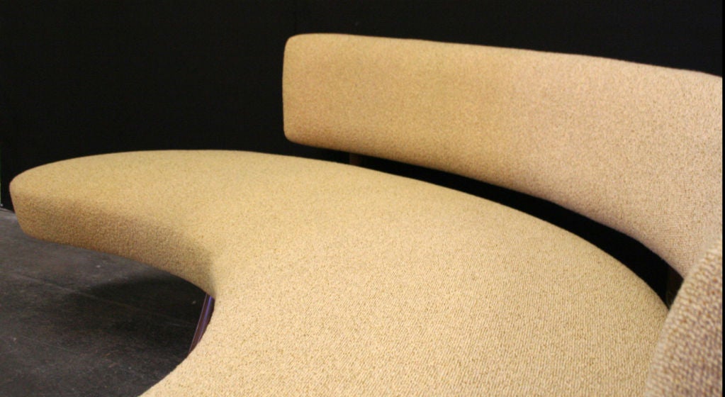 Walnut Floating Curved Sofa on Elegant Carved Base