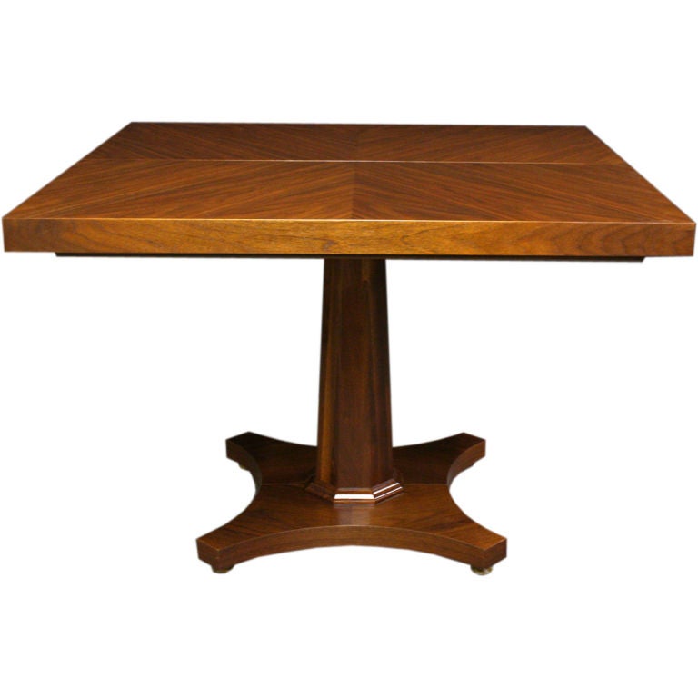 A Two Leaf Single Pedestal Extension Dining Table By