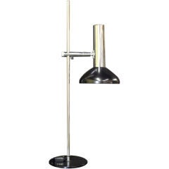 A Highly Adjustable Artemide Table Lamp on a Steel Stanscion