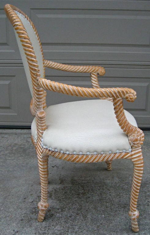 Set of four beautifully carved Rope and Tassel armchairs.