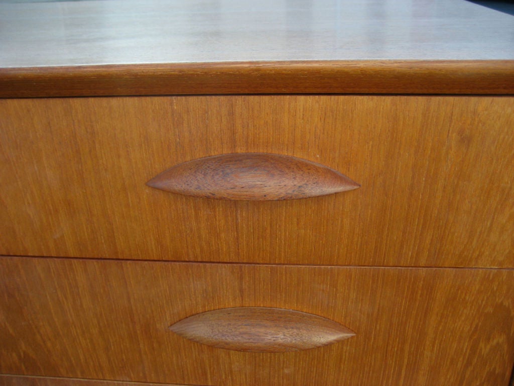 Pair of Danish Modern Teak Credenzas constructed of solid Teak.  Excellent quality materials and workmanship