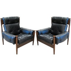 Pair Leather Lounge Chairs in the style of Finn Juhl
