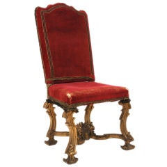 An Italian Baroque Period Finely Carved Giltwood Dining Chair