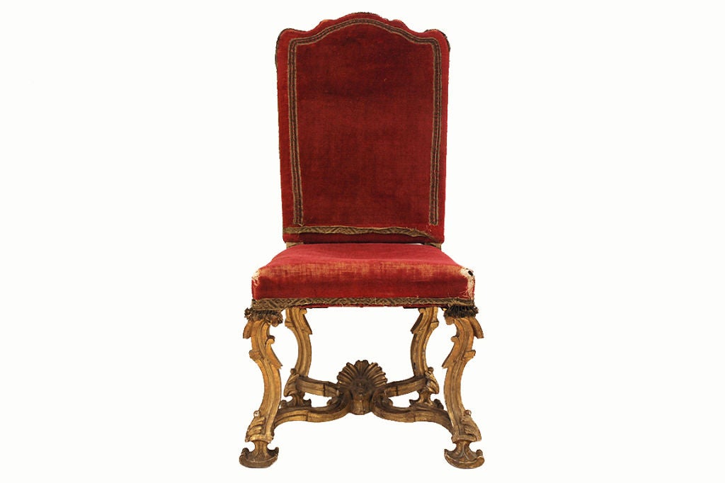 An Italian Baroque Period Finely Carved Giltwood Dining Chair
