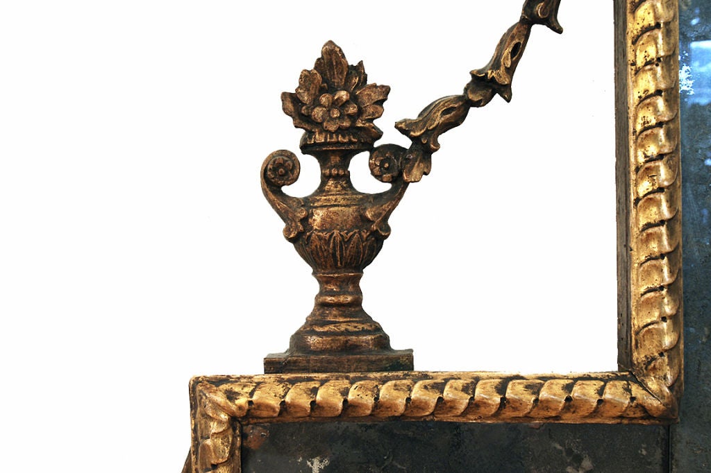 An Itallian Early Neoclassical Giltwood Overmantel Mirror