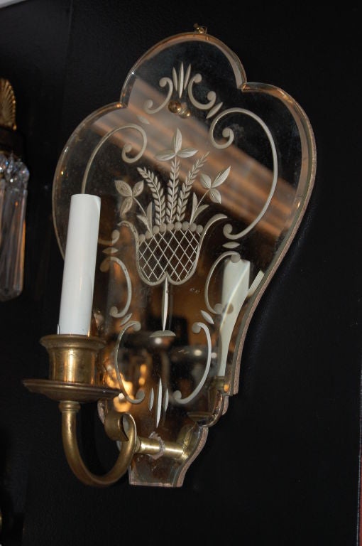 Pair of Venetian mirrored backplate sconces with etched motif.

Four pairs are available, circa 1920s.
