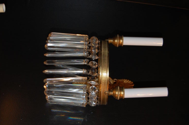 Pair of french empire style double light sconces with crystal. Set of six available