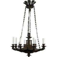 An antique eight light Empire style chandelier