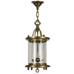 An antique brass lantern in its original aged finish