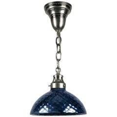 An antique blue quilted mercury glass pendant