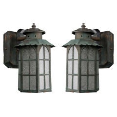 An Vintage pair of verdigris exterior wall lanterns