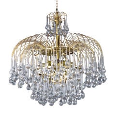 An antique chandelier with crystal drops