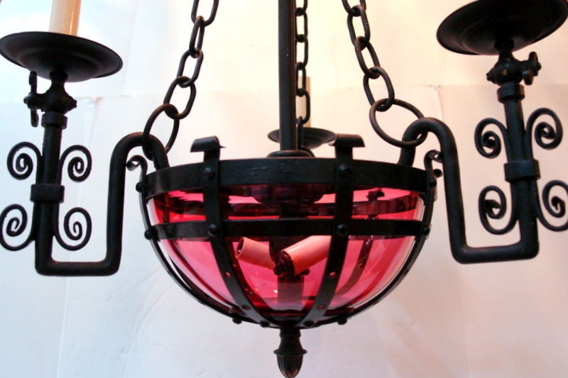 American Wrought Iron Chandelier with Cranberry Glass For Sale