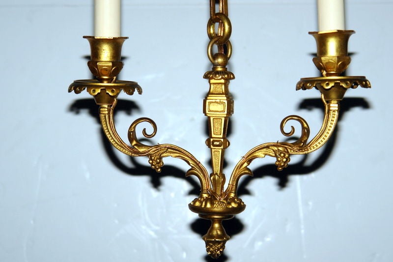 Gilt Pair of French Two-Light Chandeliers For Sale