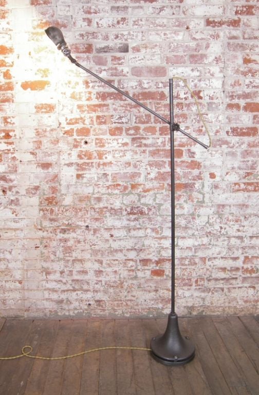 Vintage Industrial adjustable cast iron and steel floor standing task lamp, light. Shade measures 5" x 4" 2 1/4".