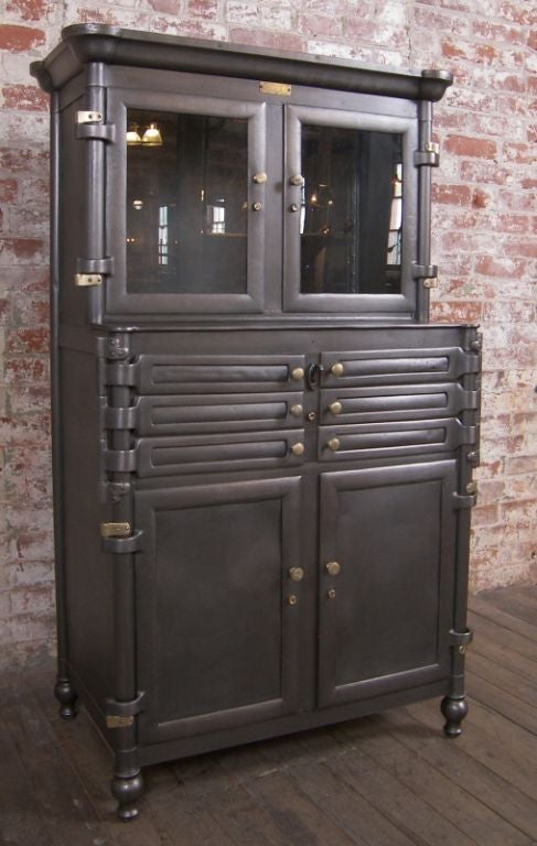 Vintage Aseptic Metal & Glass Dental Cabinet.  Two Glass Doors, Glass Shelf, 6 Swing Out Doors, Two Metal Doors.